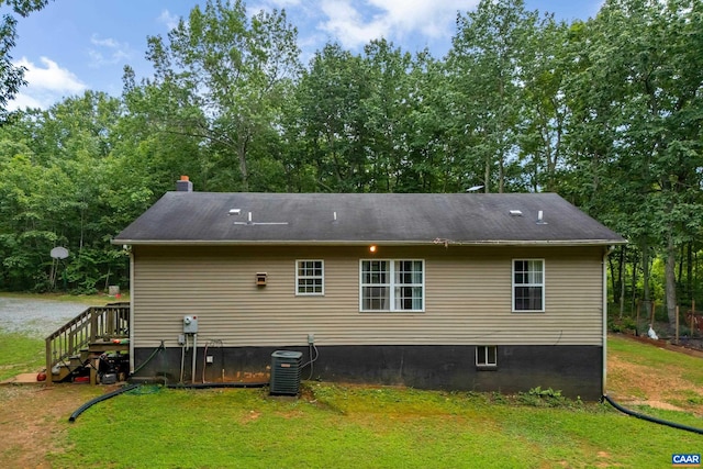 1409 Mica Rd, Mineral, VA 23117 - rear view of house featuring a lawn and a chimney