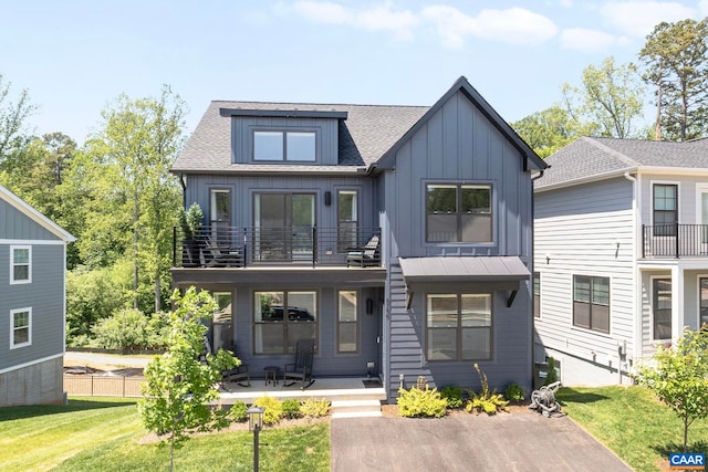3190 Horizon Rd, Charlottesville, VA 22902 - view of front of property featuring a balcony, board and batten siding, a front yard, and roof with shingles