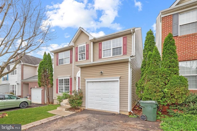 view of front of property with an attached garage and driveway