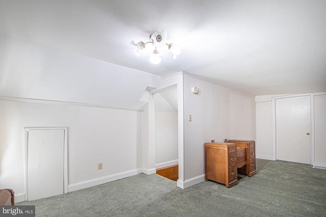  - additional living space featuring carpet and lofted ceiling