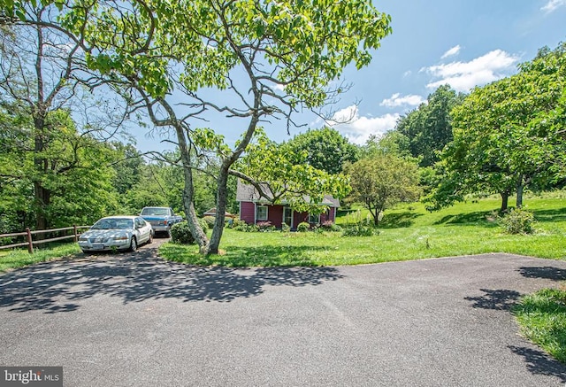  - view of property hidden behind natural elements