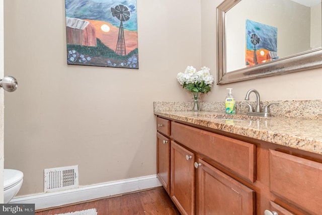 9603 Conaty Cir, Spotsylvania, VA 22553 - half bath with vanity and wood finished floors