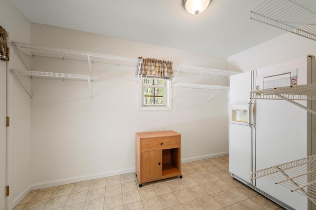 5409 Smith Creek Rd, New Market, VA 22844 - walk in closet with light tile patterned floors