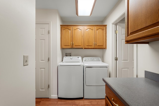 5409 Smith Creek Rd, New Market, VA 22844 - laundry area with cabinet space, separate washer and dryer, and light wood-type flooring
