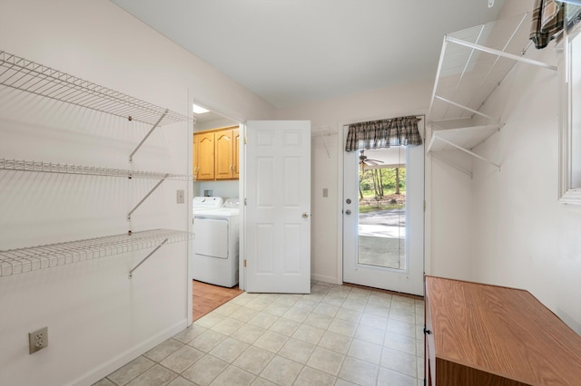 5409 Smith Creek Rd, New Market, VA 22844 - laundry room featuring cabinet space, independent washer and dryer, and light tile patterned floors
