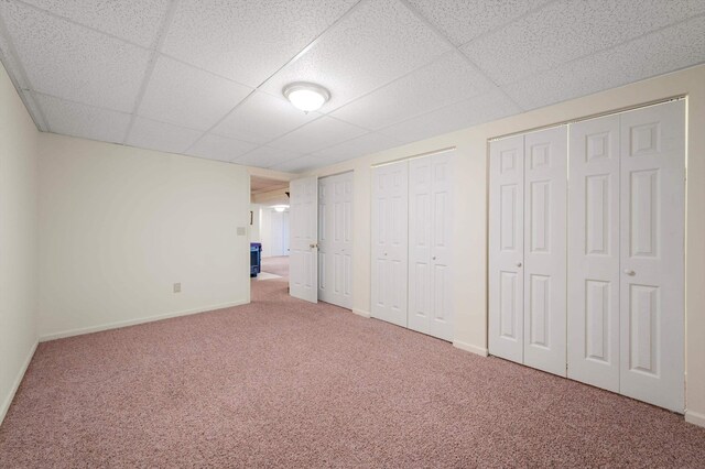 5409 Smith Creek Rd, New Market, VA 22844 - unfurnished bedroom featuring carpet floors, two closets, and a drop ceiling