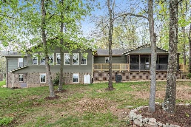 5409 Smith Creek Rd, New Market, VA 22844 - back of property with a deck, a yard, and brick siding