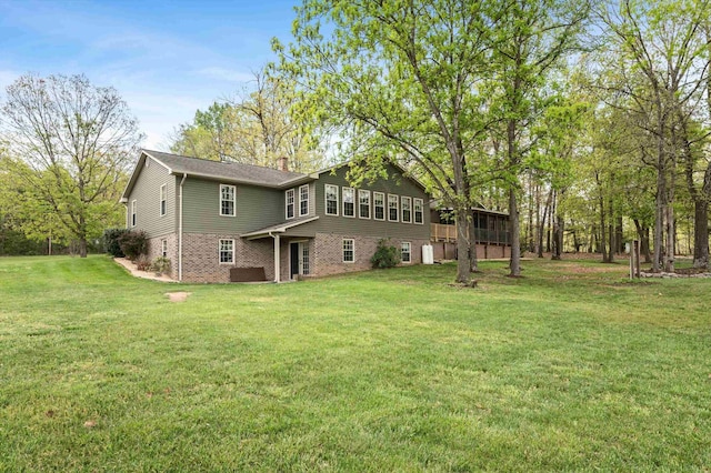 5409 Smith Creek Rd, New Market, VA 22844 - back of property with brick siding and a lawn