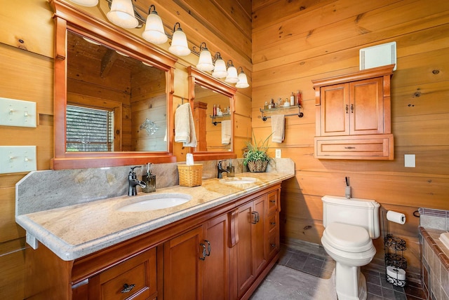 928 Melrose Rd, Rockingham, VA 22802 - full bath featuring toilet, wood walls, double vanity, and a sink