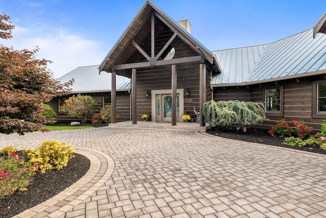 928 Melrose Rd, Rockingham, VA 22802 - view of front of property with a chimney, metal roof, and a standing seam roof