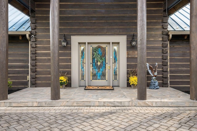928 Melrose Rd, Rockingham, VA 22802 - property entrance featuring metal roof and log exterior
