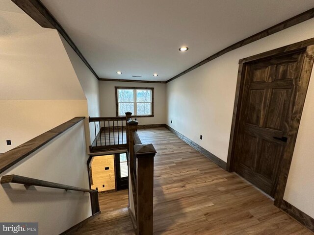 152 Susan Ln, Stanley, VA 22851 - stairway with crown molding, baseboards, wood finished floors, and recessed lighting