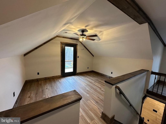 152 Susan Ln, Stanley, VA 22851 - additional living space featuring light wood-type flooring, ceiling fan, lofted ceiling, and baseboards