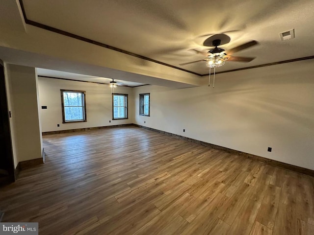 152 Susan Ln, Stanley, VA 22851 - empty room with a ceiling fan, baseboards, dark wood-style flooring, and ornamental molding