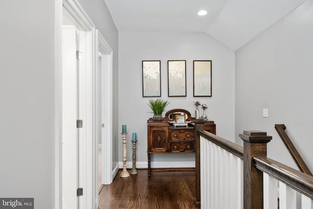 10605 Springvale Ln, Spotsylvania, VA 22551 - corridor featuring dark wood-style floors, an upstairs landing, vaulted ceiling, recessed lighting, and baseboards