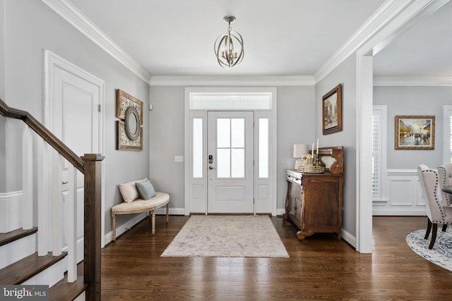 10605 Springvale Ln, Spotsylvania, VA 22551 - entryway with stairs, dark wood-style floors, ornamental molding, and a chandelier
