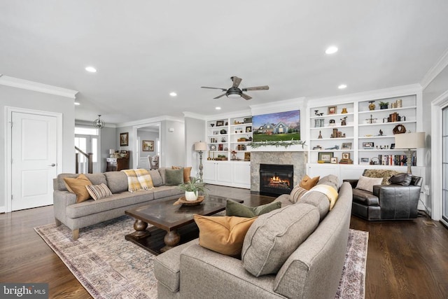 10605 Springvale Ln, Spotsylvania, VA 22551 - living area featuring ornamental molding, a ceiling fan, a fireplace with flush hearth, recessed lighting, and dark wood-style floors