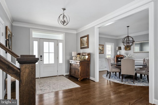 10605 Springvale Ln, Spotsylvania, VA 22551 - entryway with a chandelier, dark wood-style flooring, crown molding, and baseboards