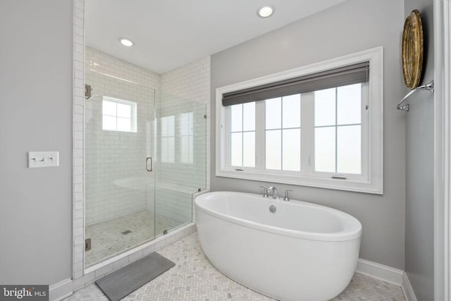 10605 Springvale Ln, Spotsylvania, VA 22551 - bathroom with a stall shower, baseboards, a soaking tub, recessed lighting, and tile patterned floors