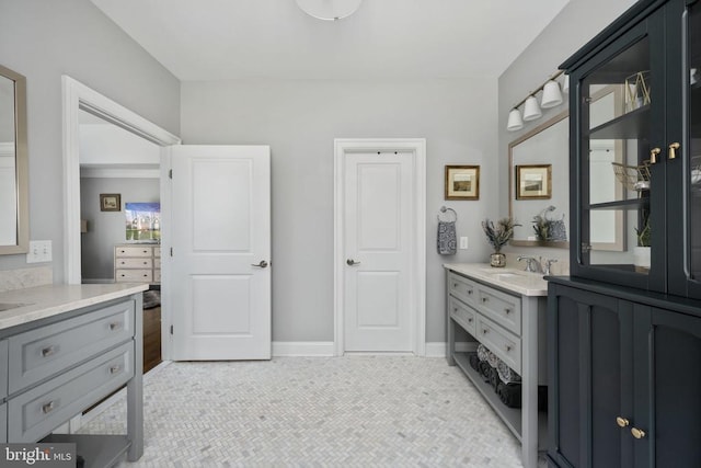 10605 Springvale Ln, Spotsylvania, VA 22551 - bathroom with vanity, tile patterned floors, and baseboards
