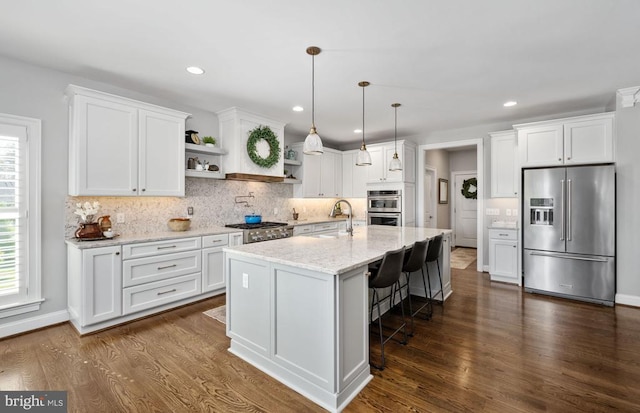 10605 Springvale Ln, Spotsylvania, VA 22551 - kitchen featuring stainless steel appliances, open shelves, a sink, white cabinets, and recessed lighting