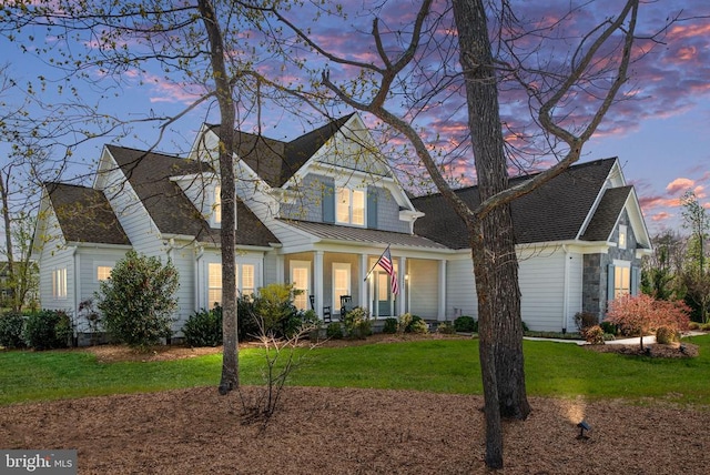 10605 Springvale Ln, Spotsylvania, VA 22551 - view of front of house with a lawn, a porch, and a shingled roof