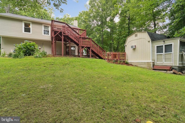 10804 Cobblestone Dr, Spotsylvania, VA 22553 - view of green lawn with stairs, a wooden deck, and an outbuilding