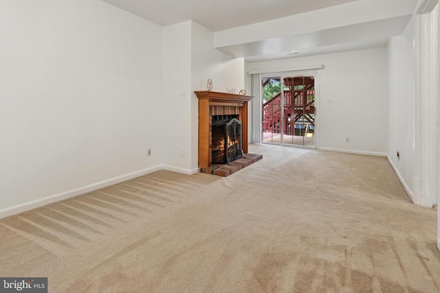 10804 Cobblestone Dr, Spotsylvania, VA 22553 - unfurnished living room featuring carpet flooring and a brick fireplace