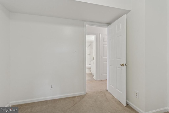 10804 Cobblestone Dr, Spotsylvania, VA 22553 - empty room featuring light carpet and baseboards