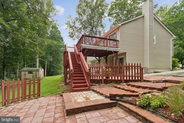 10804 Cobblestone Dr, Spotsylvania, VA 22553 - rear view of property with a patio area, a deck, a shed, stairway, and a lawn