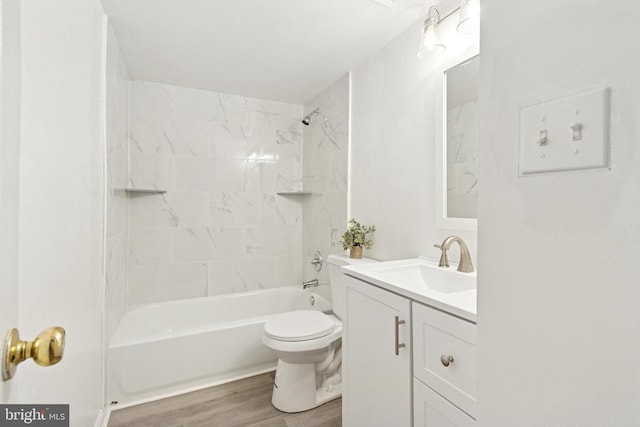 10804 Cobblestone Dr, Spotsylvania, VA 22553 - full bathroom with wood finished floors, vanity, and  shower combination
