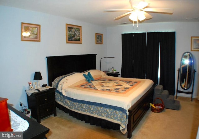  - carpeted bedroom featuring a ceiling fan