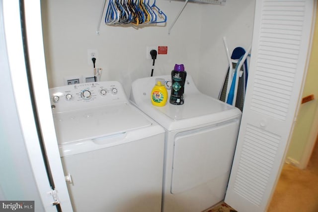  - washroom featuring washing machine and dryer