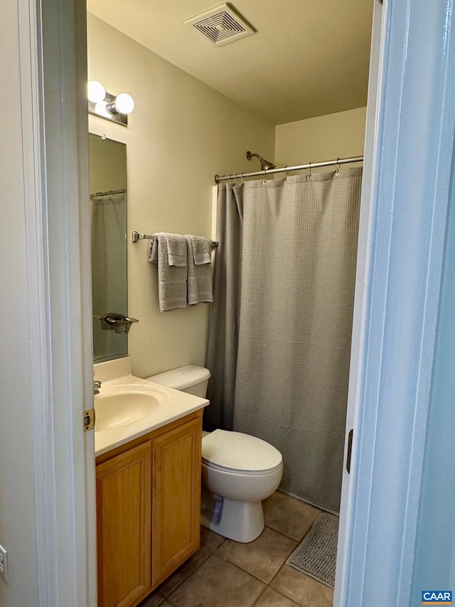 1103 Druid Ave Unit D, Charlottesville, VA 22902 - full bathroom featuring toilet, vanity, and tile patterned floors