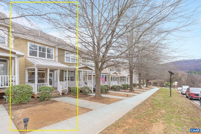 1103 Druid Ave Unit D, Charlottesville, VA 22902 - view of front of home featuring a standing seam roof, covered porch, and metal roof