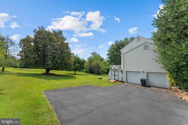 17417 Hawthorne Ave, Culpeper, VA 22701 - view of home's exterior with a storage shed, driveway, a yard, a garage, and view of scattered trees