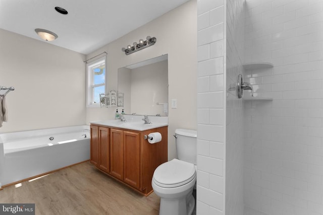 17417 Hawthorne Ave, Culpeper, VA 22701 - full bath featuring wood finished floors, double vanity, a garden tub, and tiled shower