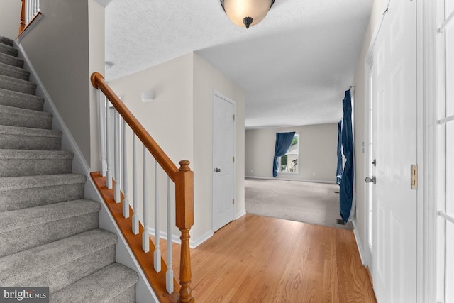 17417 Hawthorne Ave, Culpeper, VA 22701 - stairway featuring wood finished floors and baseboards