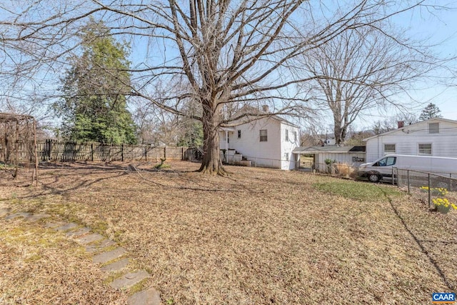view of yard with a fenced backyard