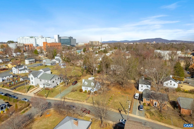 birds eye view of property featuring a mountain view and a residential view