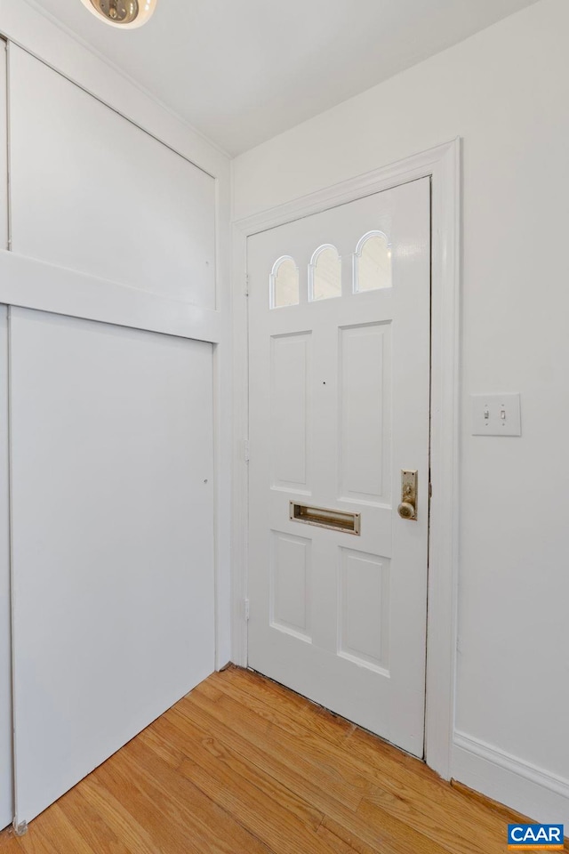 foyer with light wood finished floors