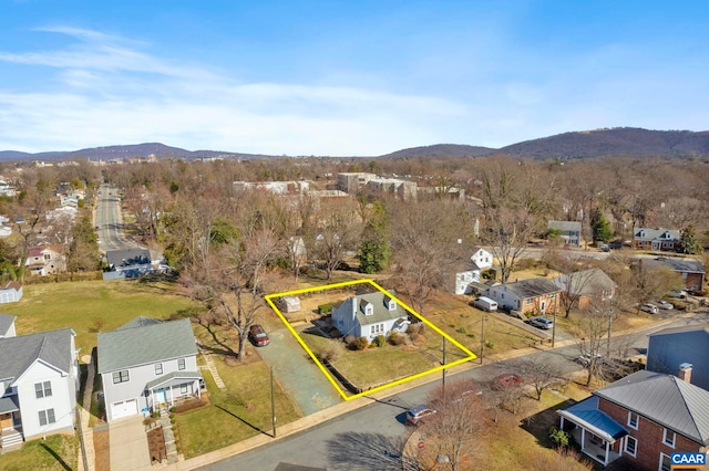 aerial view featuring a mountain view and a residential view