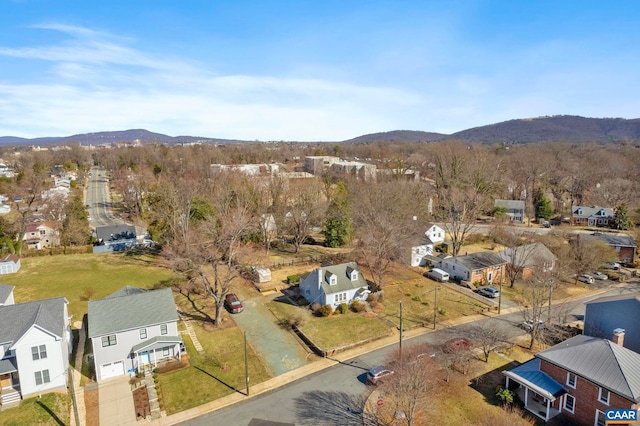 birds eye view of property with a residential view and a mountain view