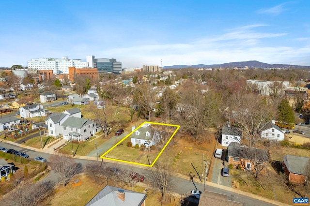 drone / aerial view featuring a mountain view