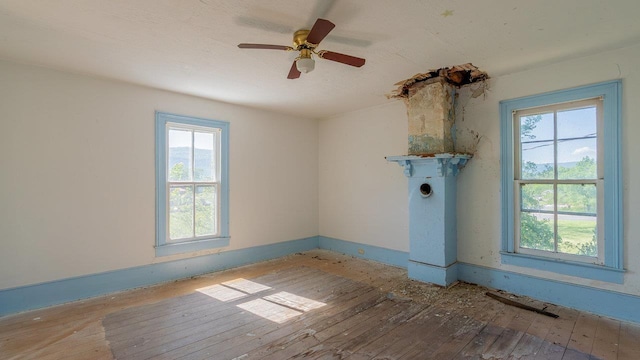 506 Williams Ave, Shenandoah, VA 22849 - unfurnished room featuring hardwood / wood-style floors, baseboards, and ceiling fan