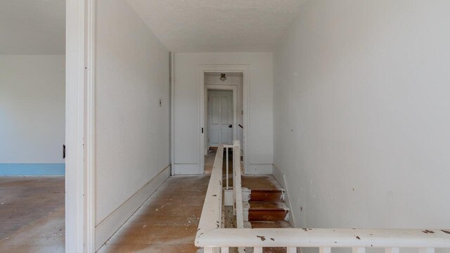 506 Williams Ave, Shenandoah, VA 22849 - stairs featuring a textured ceiling