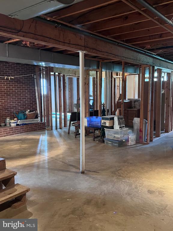  - below grade area with brick wall