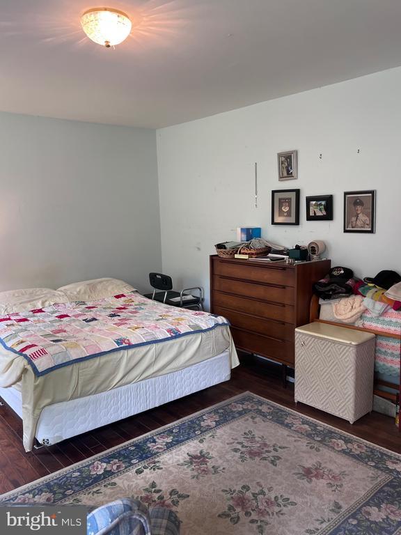  - bedroom with wood finished floors
