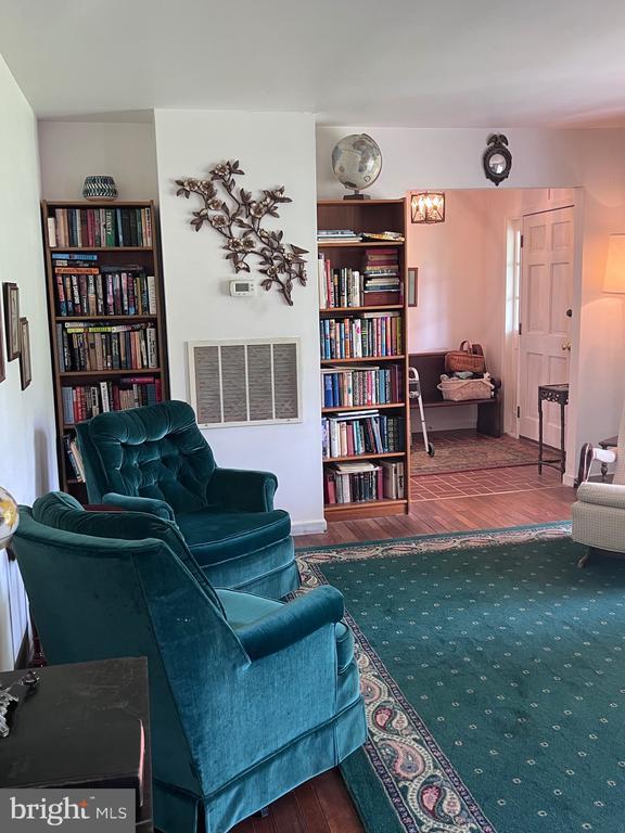  - living room featuring wood finished floors