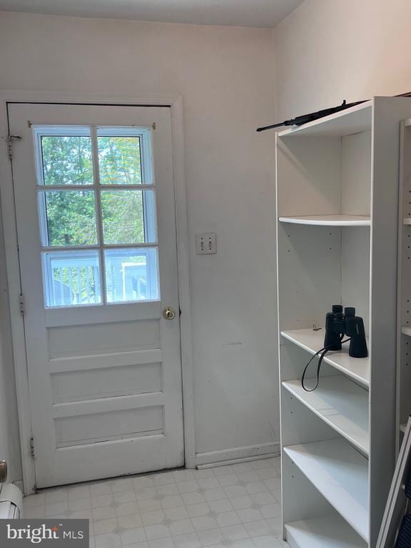  - doorway with baseboard heating